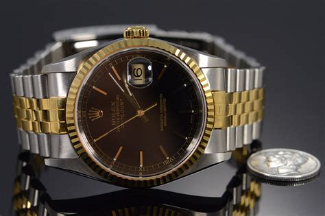 rolex oyster perpetual old black face silver gold band|rolex oyster perpetual black dial.